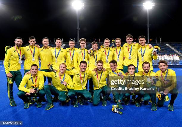 The Australian team poses for a photo after the gold medal final match between Australia and Belgium on day thirteen of the Tokyo 2020 Olympic Games...