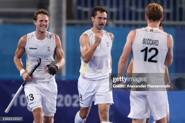 Florent van Aubel of Team Belgium celebrates with teammates after scoring their team's first goal during the Men's Gold Medal match between Australia...