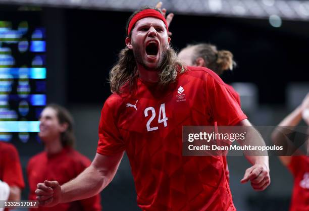 Mikkel Hansen of Team Denmark celebrates after winning the Men's Semifinal handball match between Spain and Denmark on day thirteen of the Tokyo 2020...