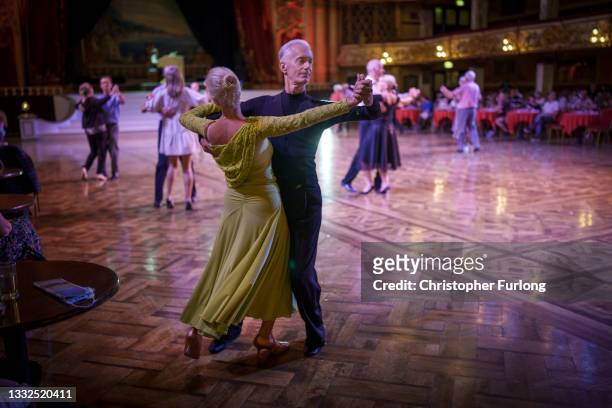 Dancers take to the famous Blackpool Tower Ballroom and move to the sound of the famous Wurlitzer organ on August 05, 2021 in Blackpool, England. The...