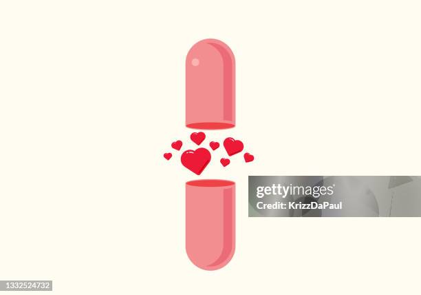 herzen in pillenkapsel - heart pill stock-grafiken, -clipart, -cartoons und -symbole