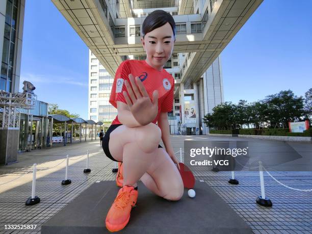 Meter-tall statue of Japanese table tennis player Kasumi Ishikawa is seen outside Fuji Televison Building on day thirteen of the Tokyo 2020 Olympic...