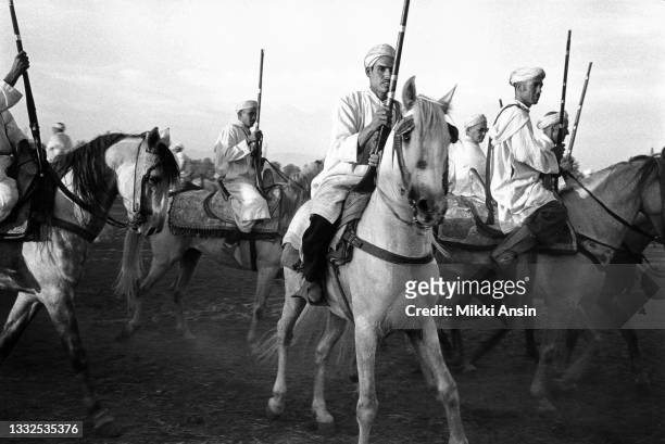 Eight hundred and twelve Berber horsemen came down from the hills to participate in this first national Fantasia, and are shown here milling around...