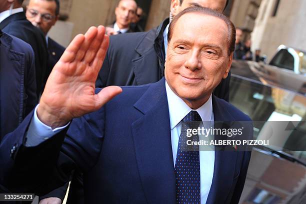 Italy's former Prime Minister and head of the Popola della Liberta delegation at the lower-house, Silvio Berlusconi, arrives at the parliament ahead...