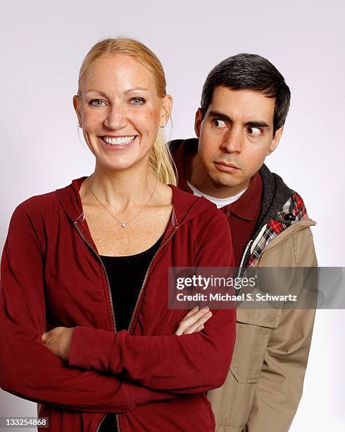 Comedians Alli Breen and Brent Weinbach pose after their performance at The Ice House Comedy Club on November 17, 2011 in Pasadena, California.