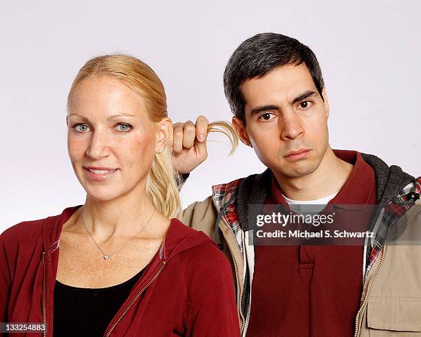 Comedians Alli Breen and Brent Weinbach pose after their performance at The Ice House Comedy Club on November 17, 2011 in Pasadena, California.