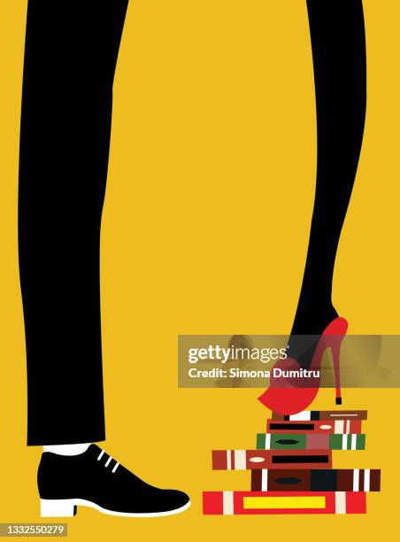 a woman standing on a pile of books because she is too short - menschliche körpergröße stock-fotos und bilder