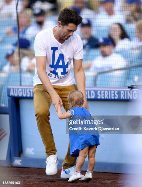 Drew Seeley, a Canadian-American actor, singer and dancer, dances with his one year old daughter Ember Florence Seeley before singing the National...