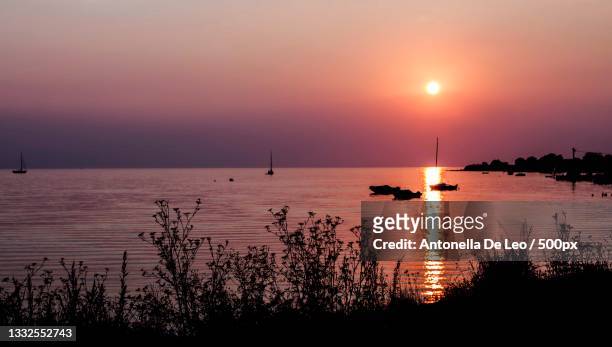 scenic view of sea against sky during sunset,umag,croatia - umag stock-fotos und bilder