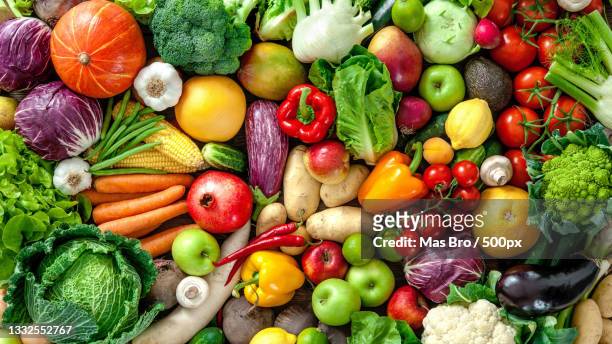 directly above shot of vegetables and fruits on table - obst stock-fotos und bilder