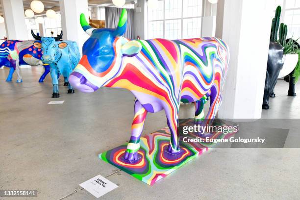 Udderly Fabulous" cow painted by Lizzie Tisch on display at the CowParade 2021 launch event hosted by God’s Love We Deliver at the Artist Studio...