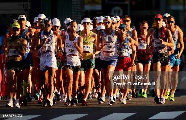 Athletes compete in the Men's 50km Race Walk Final on day fourteen of the Tokyo 2020 Olympic Games at Sapporo Odori Park on August 06, 2021 in...