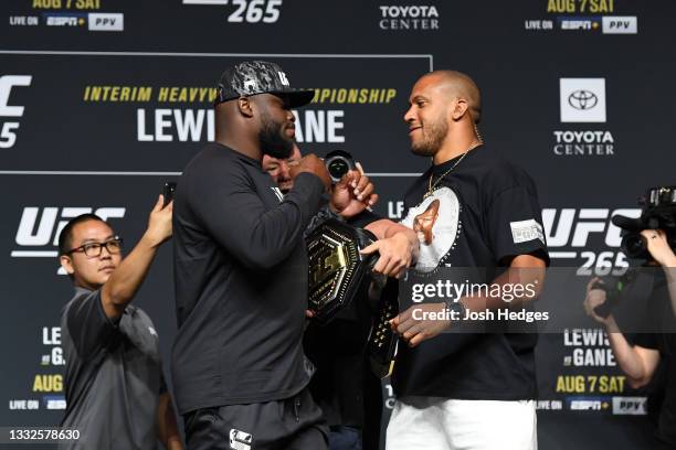 Derrick Lewis and Ciryl Gane of France face off during the UFC 265 press conference at at Toyota Center on August 05, 2021 in Houston, Texas.