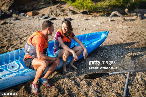 spanish kayakers in 30s and 40s after morning exercise - life jacket isolated stock pictures, royalty-free photos & images