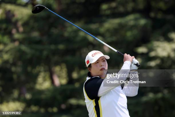 Shanshan Feng of Team China plays her shot from the 12th tee during the third round of the Women's Individual Stroke Play on day fourteen of the...