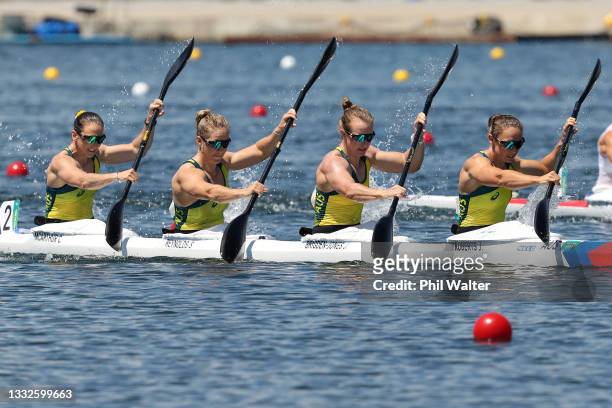 Jaime Roberts, Jo Brigden-Jones, Shannon Reynolds and Catherine McArthur of Team Australia compete during the Women's Kayak Four 500m Heat 2 on day...