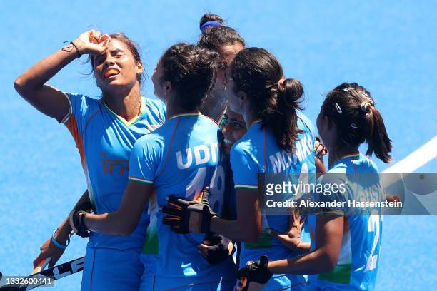 Vandana Katariya of Team India celebrates scoring their third goal with teammates during the Women's Bronze medal match between Great Britain and...