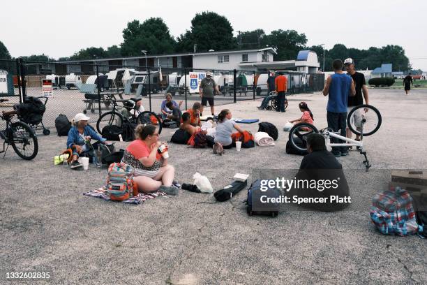 The homeless wait for the chance at securing housing in small trailers for $10 a night on August 05, 2021 in Springfield, Missouri. The homeless and...