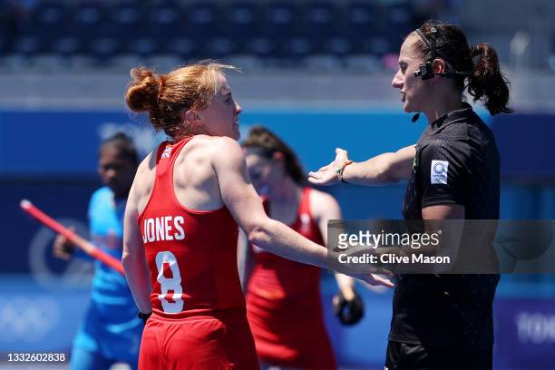 Sarah Louise Jones of Team Great Britain talks with the referee during the Women's Bronze medal match between Great Britain and India on day fourteen...