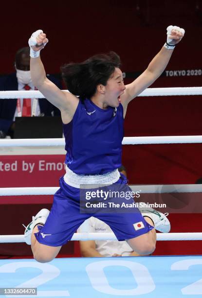 Sena Irie of Team Japan celebrates winning the gold after her victory over Nesthy Petecio of Team Philippines in the Women's Feather final on day...