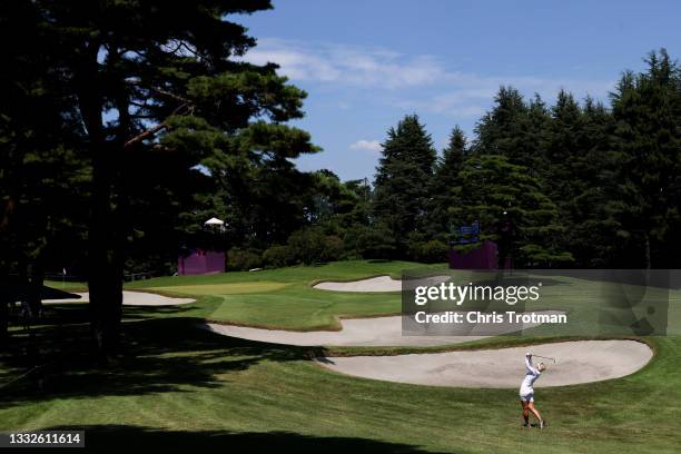 Nanna Koerstz Madsen of Team Denmark plays an approach shot on the 14th hole during the third round of the Women's Individual Stroke Play on day...