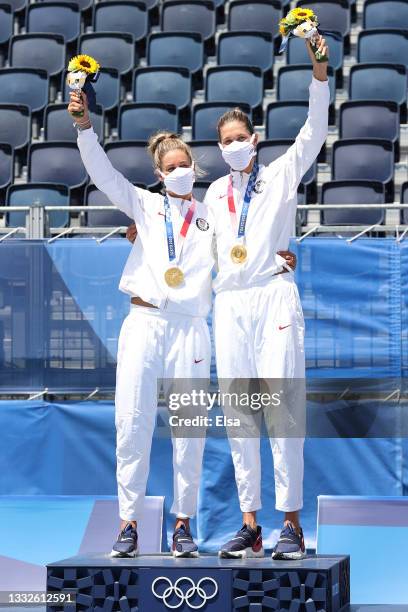 Gold medalists April Ross and Alix Klineman of Team United States pose during the medal ceremony for the Women's Beach Volleyball on day fourteen of...