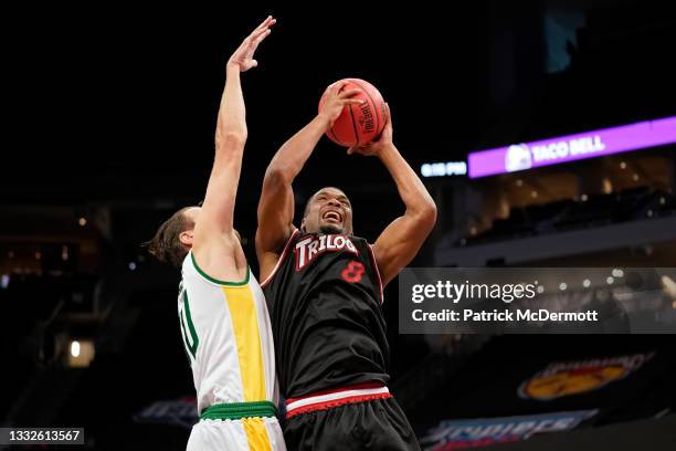 James White of the Trilogy attempts a shot while being guarded by Spencer Hawes of the Ball Hogs during BIG3 - Week Five at the Fiserv Forum on...