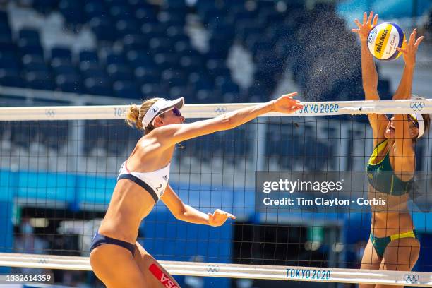 August 6: Alix Klineman of the United States defended by Taliqua Clancy of Australia during the beach volleyball final for women at Shiokaze Park...