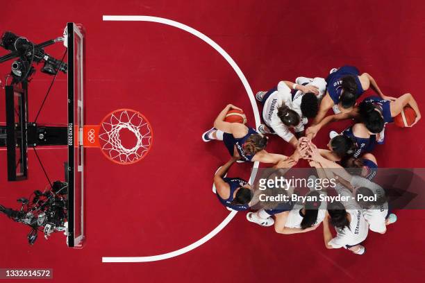 Team Serbia huddles together before the start of a Women's Basketball Semifinals game between Team United States and Team Serbia on day fourteen of...