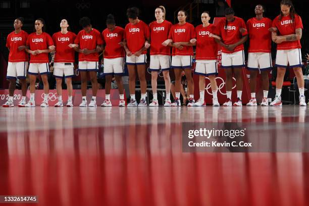 Team United States of America stands for the National Anthem before the start of a Women's Basketball Semifinals game between Team United States and...