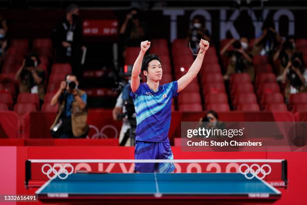 Mizutani Jun of Team Japan celebrates winning his Men's Team Bronze Medal table tennis match on day fourteen of the Tokyo 2020 Olympic Games at Tokyo...