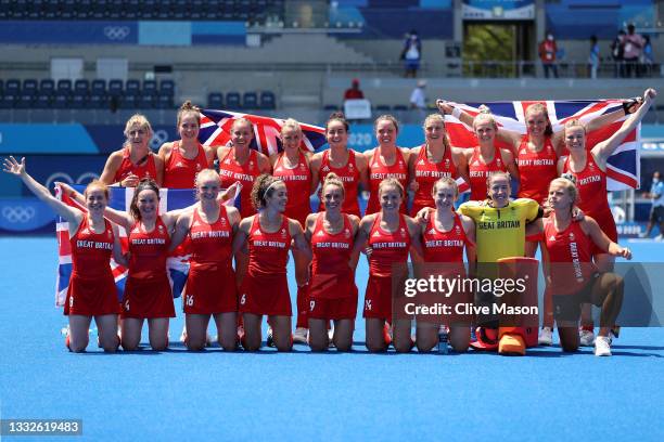 Team Great Britain pose for a photo after winning the Women's Bronze medal match between Great Britain and India on day fourteen of the Tokyo 2020...