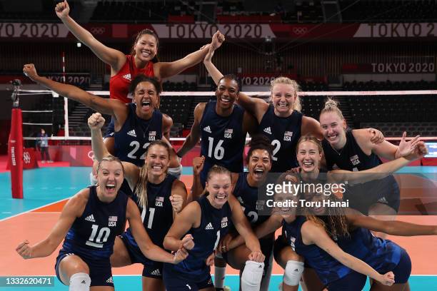 Team United States poses after defeating Team Serbia during the Women's Semifinals on day fourteen of the Tokyo 2020 Olympic Games at Ariake Arena on...