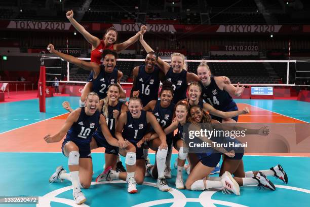 Team United States poses after defeating Team Serbia during the Women's Semifinals on day fourteen of the Tokyo 2020 Olympic Games at Ariake Arena on...