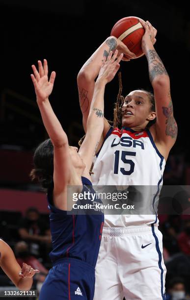 Brittney Griner of Team United States shoots against Jelena Brooks of Team Serbia during the second half of a Women's Basketball Semifinals game on...