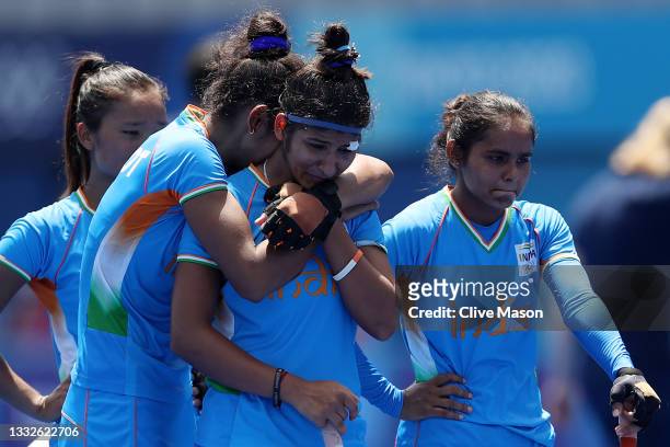 Navneet Kaur and Nisha of Team India react following their loss in the Women's Bronze medal match between Great Britain and India on day fourteen of...