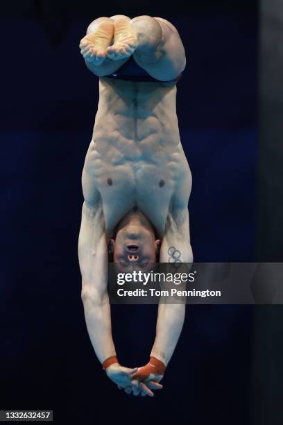 Tom Daley of Team Great Britain competes in the Men's 10m Platform preliminaries on day fourteen of the Tokyo 2020 Olympic Games at Tokyo Aquatics...