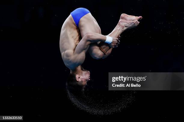 Jian Yang of Team China competes in the Men's 10m Platform preliminaries on day fourteen of the Tokyo 2020 Olympic Games at Tokyo Aquatics Centre on...