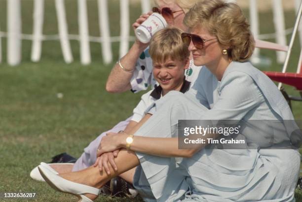 British Royal Diana, Princess of Wales , wearing a pale blue Catherine Walker dress, with her son Prince William and her mother Frances Shand Kydd...