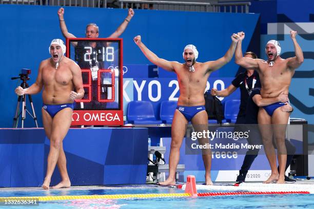 Team Greece celebrate the win during the Men's Semifinal match between Greece and Hungary on day fourteen of the Tokyo 2020 Olympic Games at Tatsumi...