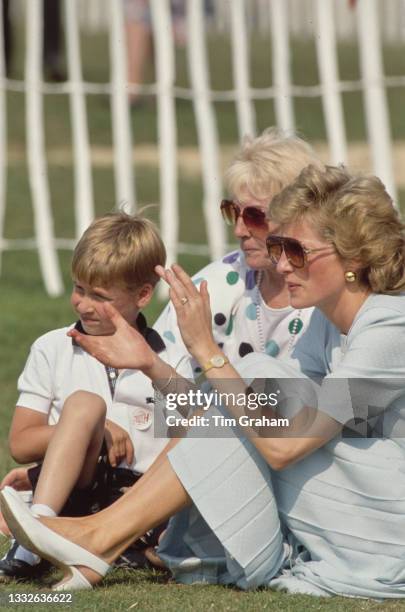 British Royal Diana, Princess of Wales , wearing a pale blue Catherine Walker dress, with her son Prince William and her mother Frances Shand Kydd...