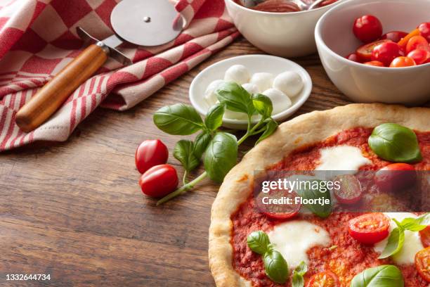 italian food: pizza margherita still life - cherry tomato stock pictures, royalty-free photos & images