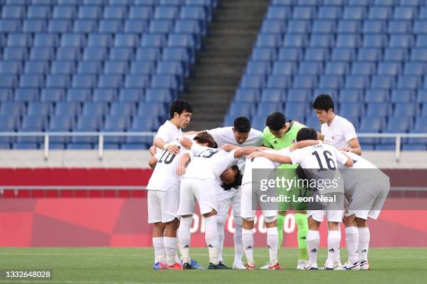 Players of Team Japan form a huddle prior to the Men's Bronze Medal Match between Mexico and Japan on day fourteen of the Tokyo 2020 Olympic Games at...