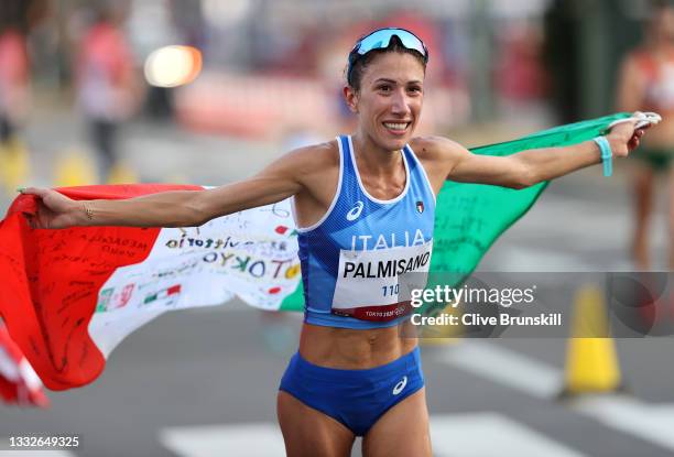 Antonella Palmisano of Team Italy celebrates winning gold in the Women's 20km Race Walk on day fourteen of the Tokyo 2020 Olympic Games at Sapporo...