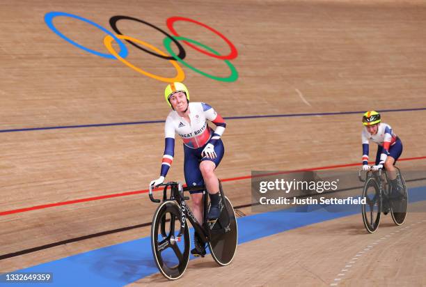 Katie Archibald and Laura Kenny of Team Great Britain celebrate winning a gold medal during the Women's Madison final of the track cycling on day...