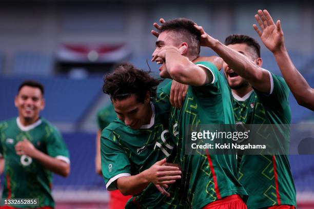 Johan Vasquez of Team Mexico celebrates with Diego Lainez after scoring their side's second goal during the Men's Bronze Medal Match between Mexico...