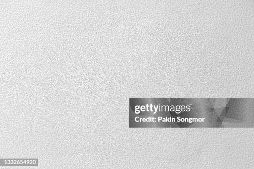 White color old grunge wall concrete texture as background. White color old grunge wall concrete texture as background.