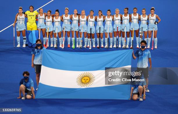Team Argentina sing their national anthem prior to the Women's Gold Medal match between Netherlands and Argentina on day fourteen of the Tokyo 2020...