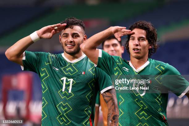 Alexis Vega of Team Mexico celebrates with Diego Lainez after scoring their side's third goal during the Men's Bronze Medal Match between Mexico and...