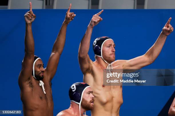 To R, Max Irving, Alex Bowen and Dylan Woodhead of Team United States celebrate during the Men's Classification 5th-8th match between Italy and the...